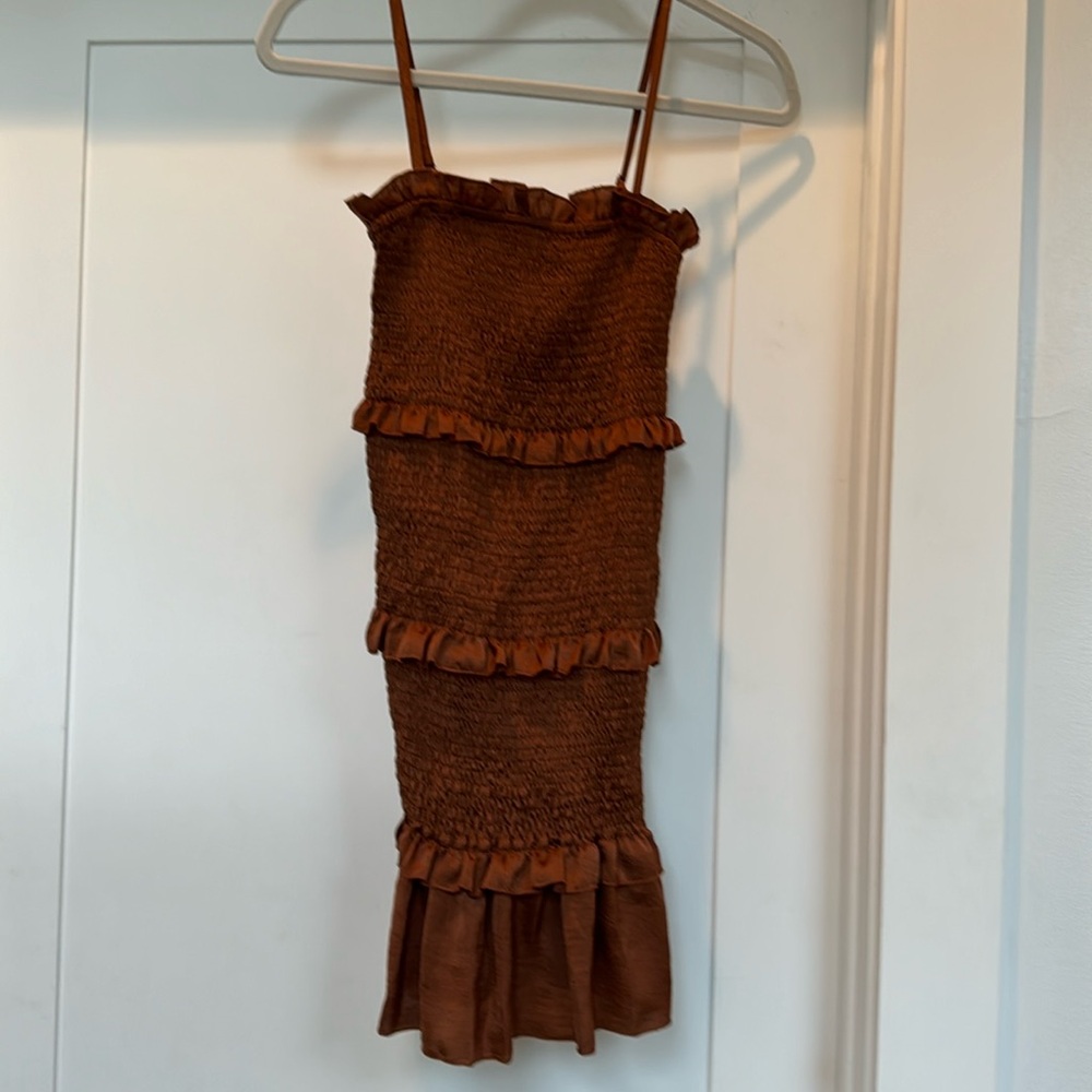 Silk stretch dress in brown/burnt orange with adjustable straps in size medium